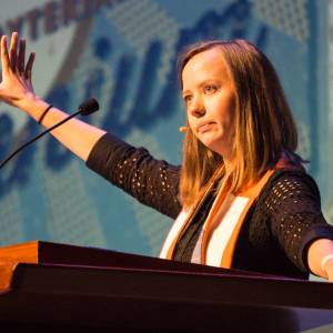 Anna Sweet Brockman preaches on the theme of 'Go and do likewise' from the parable of the Good Samaritan at Wednesday's Presbyterian Youth Triennium worship service. (Photo by Gregg Brekke)