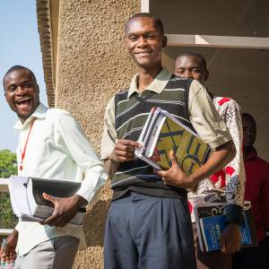 Lukas Nkhoma, Jonathan Thole and Watanga Ngoma leave the classroom at Justo Mwale University in Lusaka, Zambia. (Photo by Johanneke Kroesbergen)