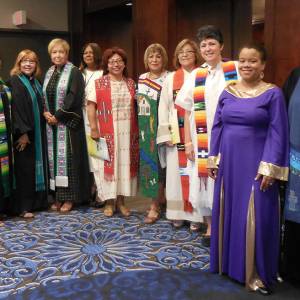 Ministers of Word and Sacrament line up to process for worship. (From left) Ruth Santana-Grace, Nydia Fernández, Carmen J. Torres-Cordero, Carmen Rosario Riviere, Sebastiana Javier (Lay Leader and International Guest from the Association of evangelical women in the Dominican Republic), Amy Méndez, Reyna Mairena, Margarita Reyes, Magdalena García, Jeniffer Rodríguez-Michel, and Marissa Galván-Valle. (Photo provided)