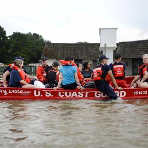 Coast Guardsmen rescue stranded residents from high water during severe flooding around Baton Rouge, La., Aug. 14, 2016. (Photo by Petty Officer 3rd Class Brandon Giles)