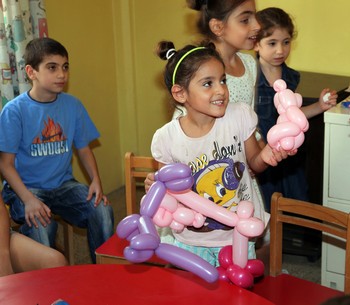 Smiling girl with balloon