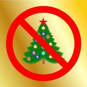 Illustration of a Christmas tree with an international "no" symbol — a red circle with a diagonal slash through it