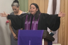 Rev. Eileen Rivas of Mision Presbiteriana Rio Grande giving benediction