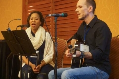 Ayana and Aaron Teter lead music during opening worship. (Photo by Emily Enders Odom)