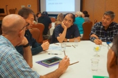 Conference attendees share in small groups. The Rev. Moongil Cho, the PMA’s associate for Korean Intercultural Congregational Support and a member of the conference planning team, is at right. (Photo by Emily Enders Odom)