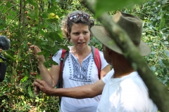 Ansley Wright learning about coffee cultivation from Don Jorge