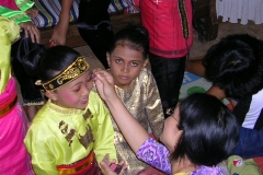 Muji's daughter Tina, when she was a girl, preparing to dance in our home.