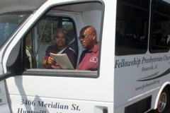 Bettye Dixie and Bob Wilson look over directions that will take the Golden Charmers of Fellowship Presbyterian Church in Huntsville, AL.