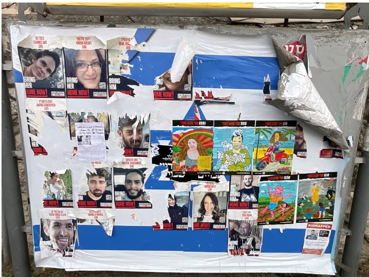 Posters of Israeli hostages hanging in a West Jerusalem neighborhood