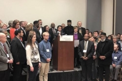 Jill Maderer, associate rabbi at Congregation Rodeph Shalom, addresses media at a press conference held with colleagues from the Interfaith Center of Greater Philadelphia following the vandalism at Mount Carmel cemetery. (Photo courtesy Yosef Goldman)