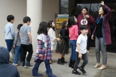 Teaching children to be mission oriented is part of the educational process at Korean Central Presbyterian Church. One class went to New American Pathways offices to donate goods for refugees. (Courtesy of Hyorim Kim)