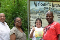 Rebecca Reyes (second from right) joins former SDOP Coordinator Cynthia White at an International Task Force meeting in Belize. (Photo from SDOP)