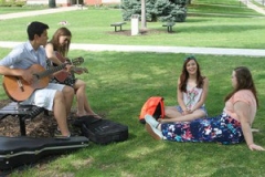 Caleb Chincoya sings with fellow students on the University of Dubuque quad. —Daniel T. Gashangi