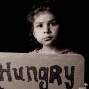 girl with hungry sign