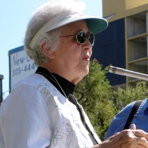 Olga speaking at a public rally