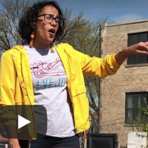 Vivi Moreno explains community garden