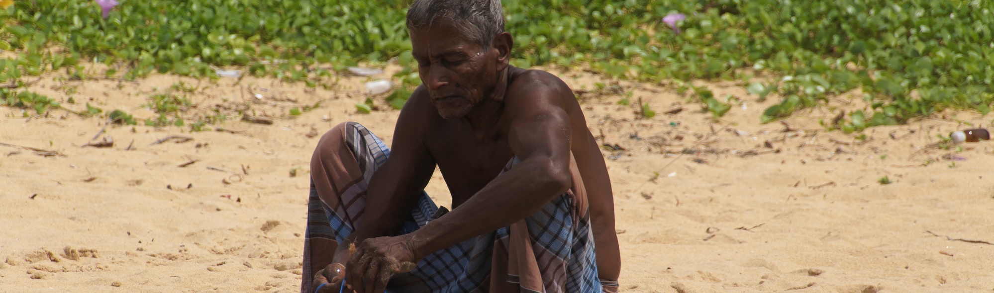 man on beach in Sri Lanka